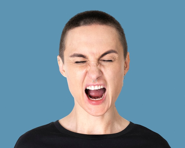 Free photo skinhead transgender man, screaming face portrait