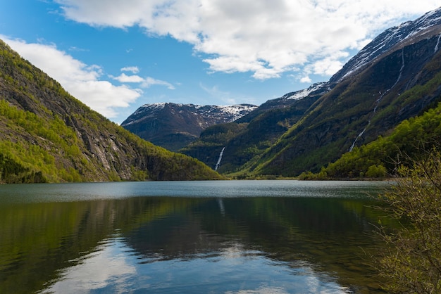 Free Photo skjolden norway may 16 2023 mountain and waterfall