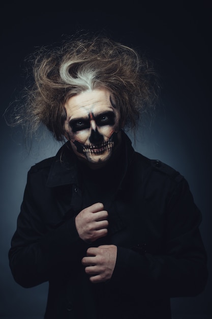 Free photo skull makeup portrait of young man