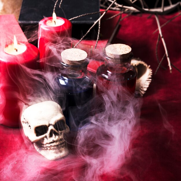 Skull and potions on smoke