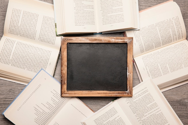 Slate in middle of books