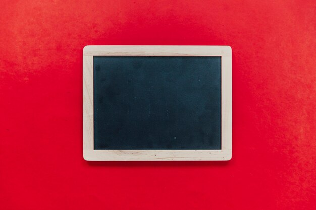 Slate on red background