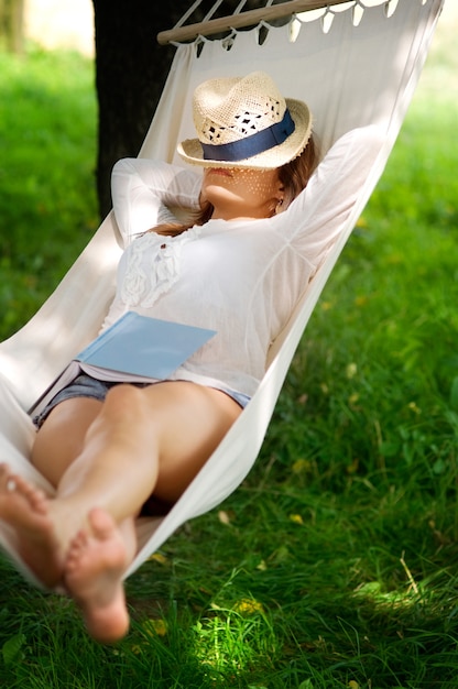 Free photo sleeping on hammock