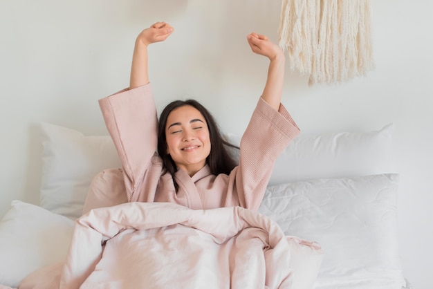 Sleepy woman stretching