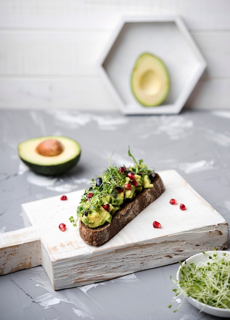 Free Photo slice of bread with avocado pasta and veggies