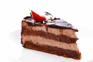 Free photo slice of tasty chocolate cake with strawberry on top