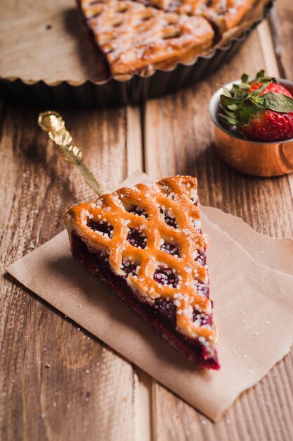 Slice of tasty tart with jam