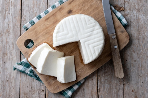 Free Photo sliced fresh white cheese from cow's milk on white background