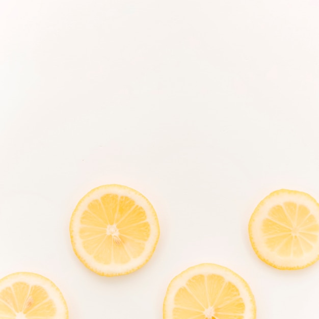 Free Photo sliced lemon on white background