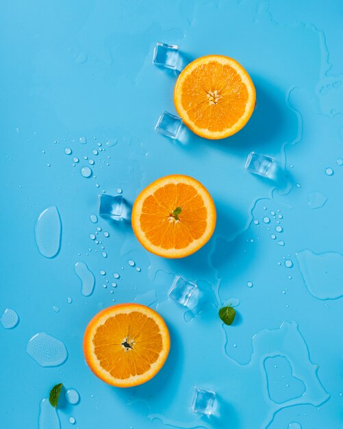 Sliced orange over ice cubes