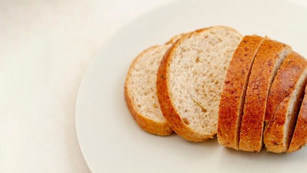 Slices of bread on white plate