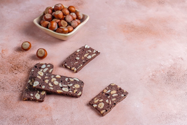 Slices of dry bread with hazelnuts.