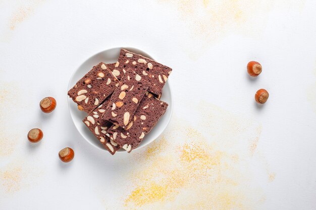 Slices of dry bread with hazelnuts.