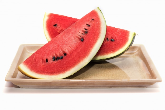 Slices of fresh watermelon isolated on white background