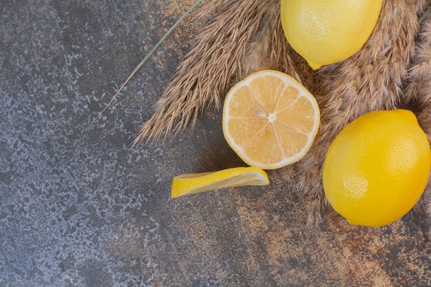 Slices of lemon on marble surface