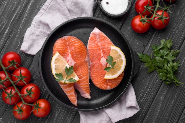 Slices of raw red salmon top view