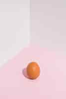 Free photo small brown chicken egg on table