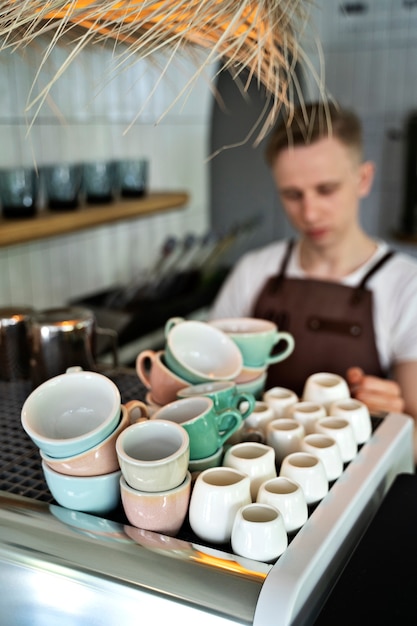 Free photo small business owner cleaning up coffee shop