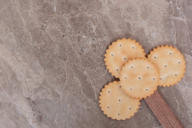 Small cookies on marble surface