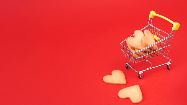 Small heart cookies in grocery cart 