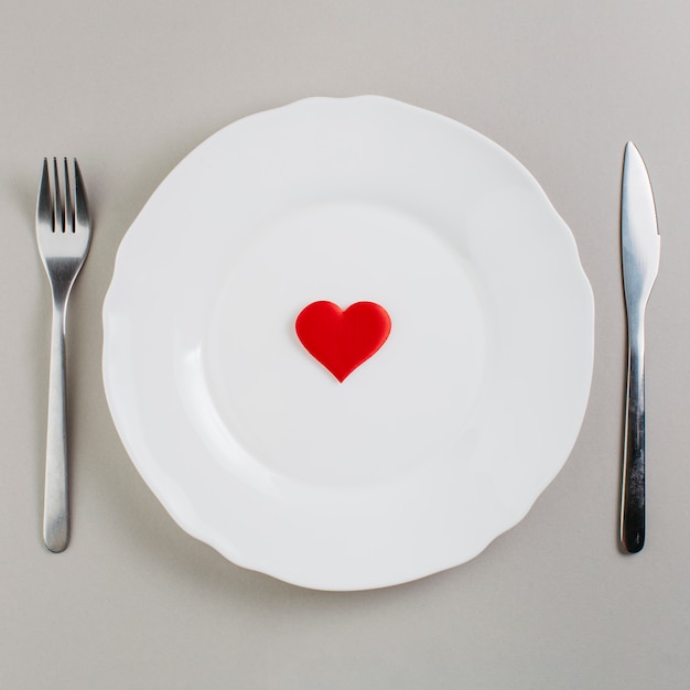 Small red heart on plate