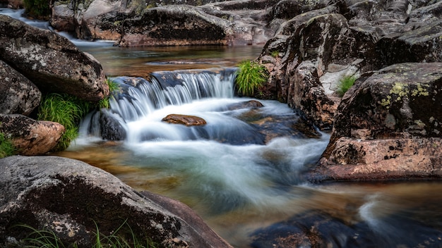 Free Photo small waterfall on the verdugo river in puentecaldelas