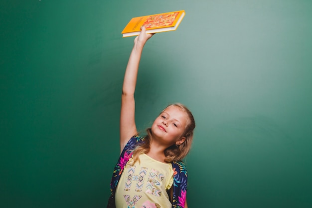 Free photo smart girl holding book