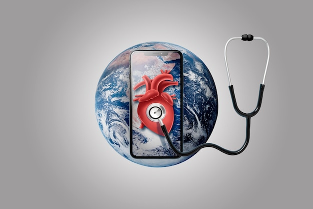 Free photo smartphone on earth with stethoscope on a heart