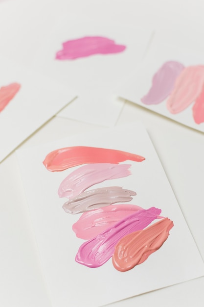 Free Photo  smears of pastel colors lipstick on paper sheets