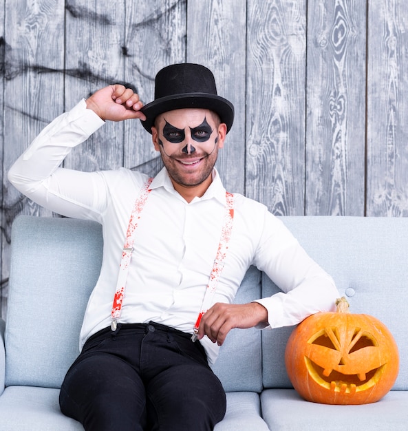 Free Photo smiley adult man posing for halloween