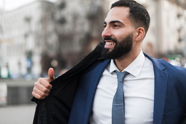 Free Photo smiley business man outdoor