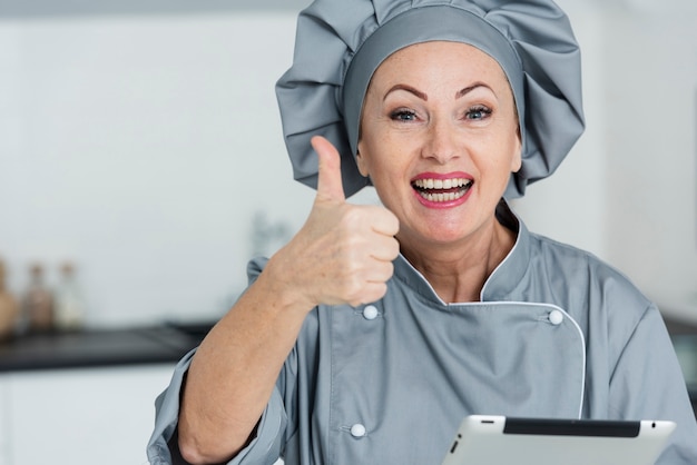 Smiley chef showing ok sign