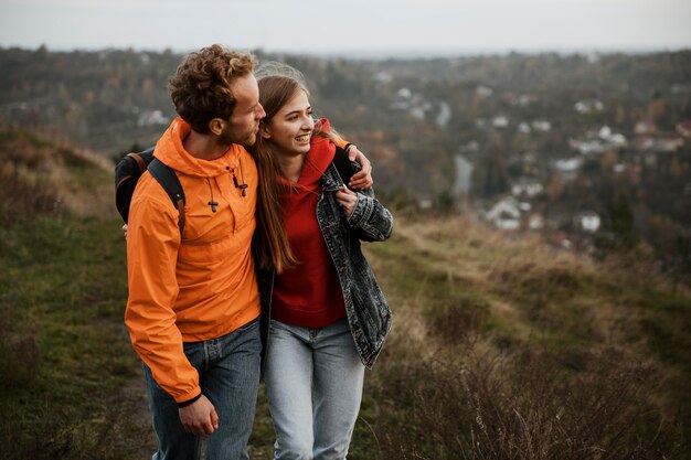 Smiley couple enjoying a road trip