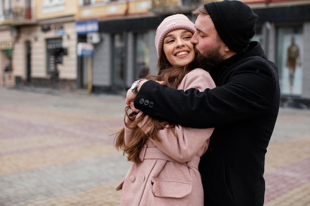 Smiley couple hugging