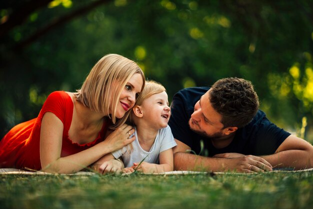 Smiley family having a good time in the park