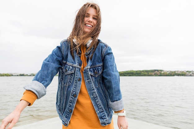 Free Photo smiley female with headphones