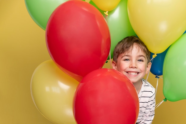 Smiley little boy celebrating a birthday