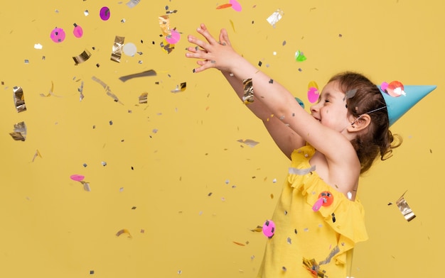 Smiley little girl celebrating a birthday