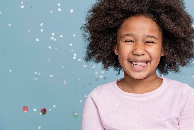 Smiley little girl celebrating her birthday