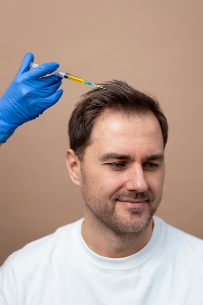 Smiley man getting prp injection