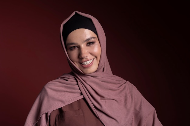 Smiley muslim woman wearing a hijab