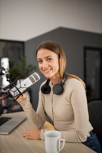 Free Photo smiley woman doing radio