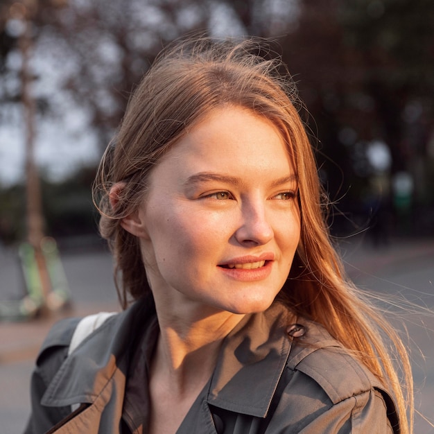 Smiley woman outdoors in the city