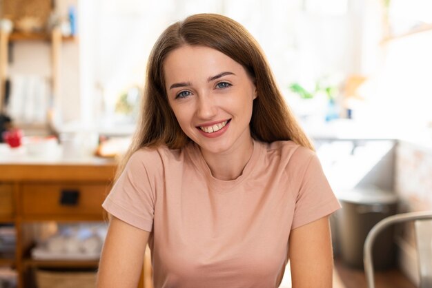 Smiley woman posing in her home