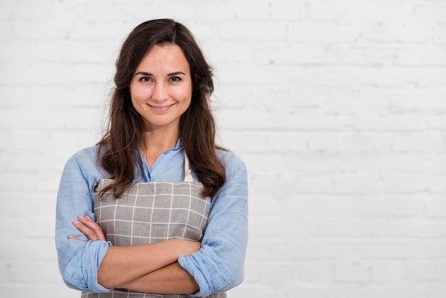 Smiley woman posing with copy space