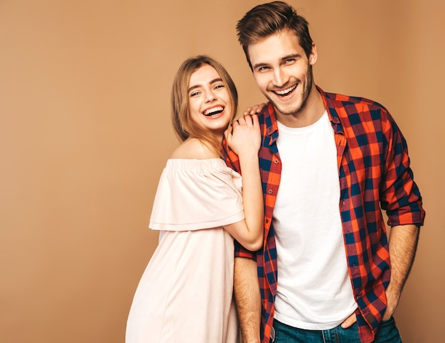 Smiling Beautiful Girl and her Handsome Boyfriend laughing.