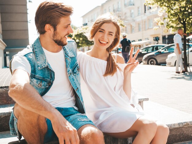 Smiling beautiful girl and her handsome boyfriend. 