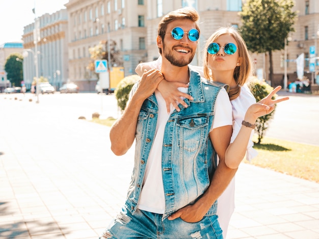 Smiling beautiful girl and her handsome boyfriend.