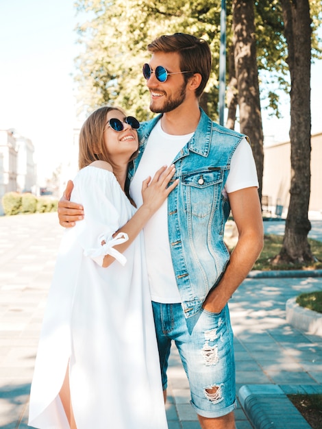 Smiling beautiful girl and her handsome boyfriend. 