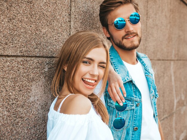 Smiling beautiful girl and her handsome boyfriend.